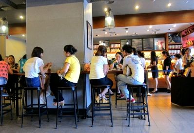 In China, Starbucks is a place to sit back and relax.